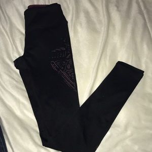 Black leggings with drainage on left leg